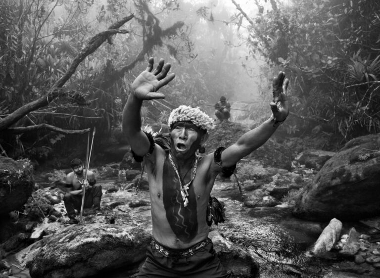 Yanomami shaman interacts with spirits before an ascent to Pico da Neblina. State of Amazonas, Brazil, 2014. © Sebastião Salgado